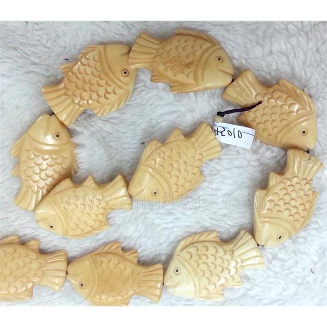 antique cattle bone beads, fish