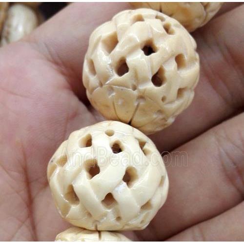 round antique cattle bone bead, yellow
