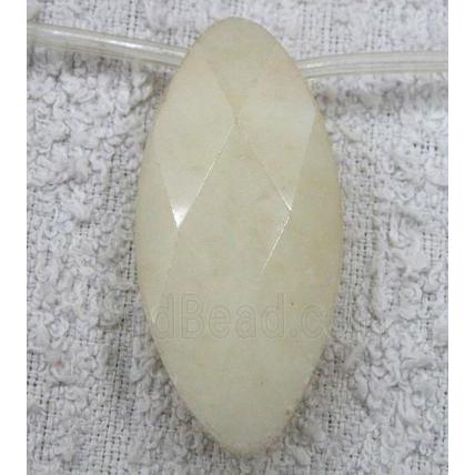 yellow jade bead, faceted flat-oval