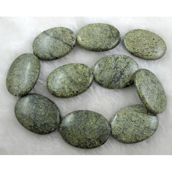 Flat oval gemstone bead