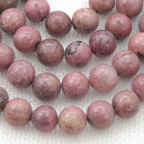 Rhodonite beads, round, AA grade
