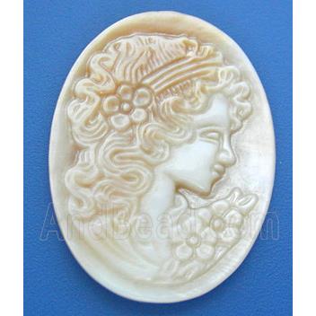 Mother of Pearl cabochon, oval, carved beauty, white