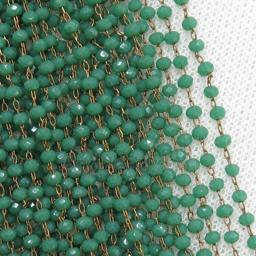 raw brass chain with green crystal glass