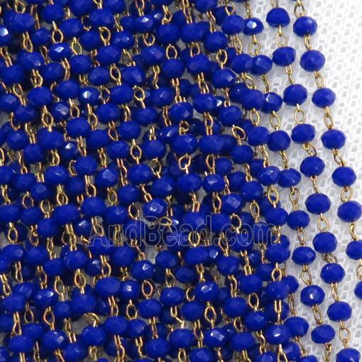 raw brass chain with blue crystal glass
