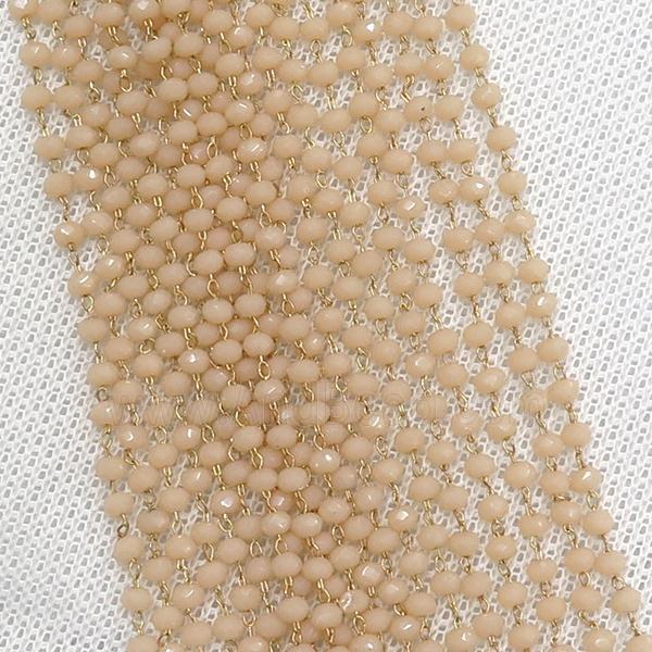 raw brass chain with peach crystal glass