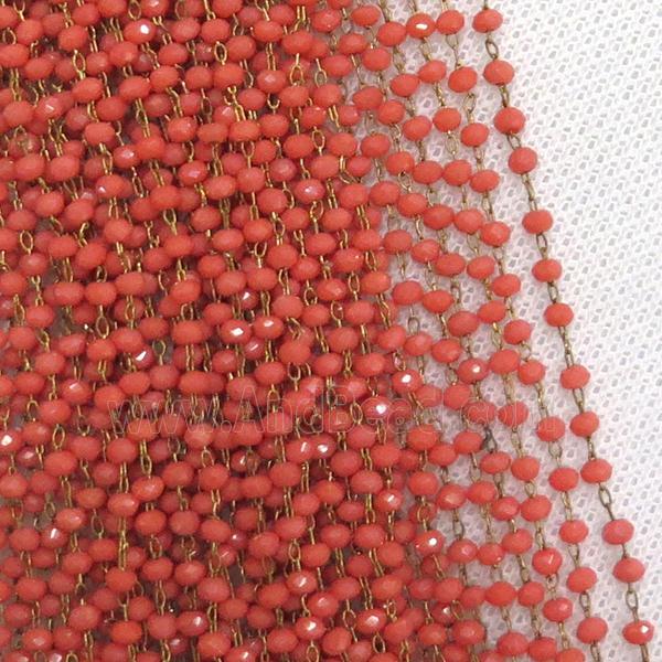 raw brass chain with red crystal glass