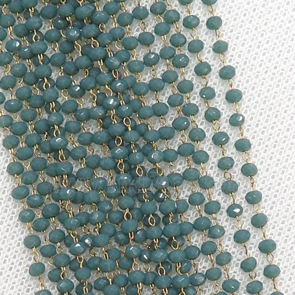 raw brass chain with green crystal glass