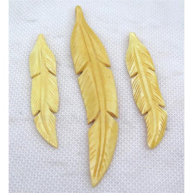yellow bone feather pendant