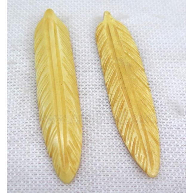 yellow bone feather pendant