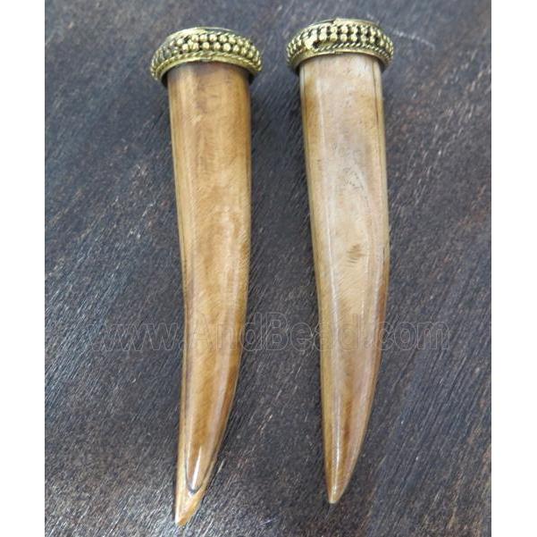cattle bone pendant, horn, brown