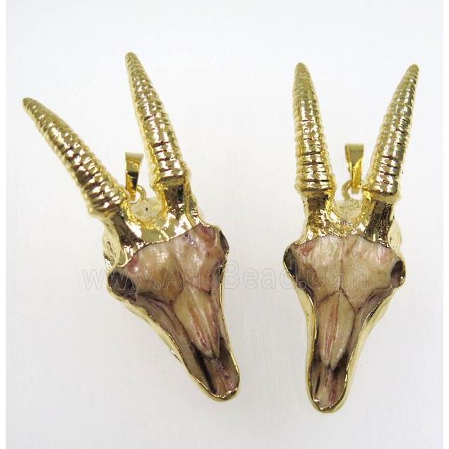 resin goatHead pendant, gold plated