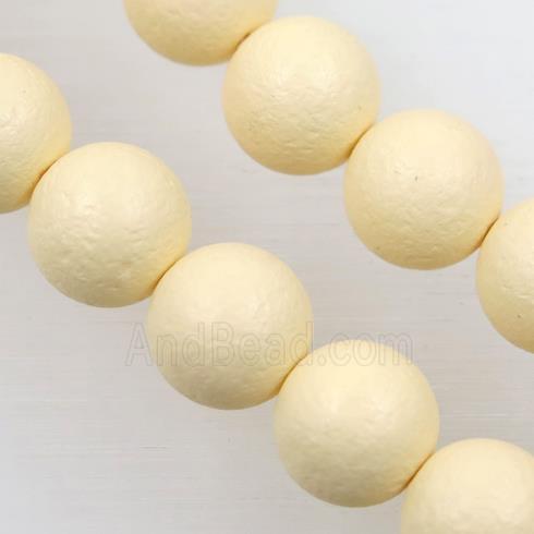 round matte yellow pearlized shell beads