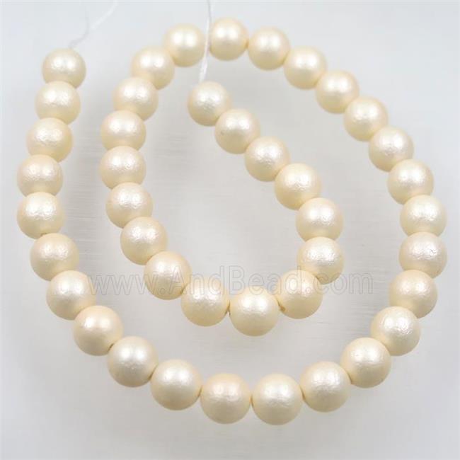 round matte lt.yellow pearlized shell beads