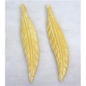 yellow bone feather pendant, approx 20-105mm