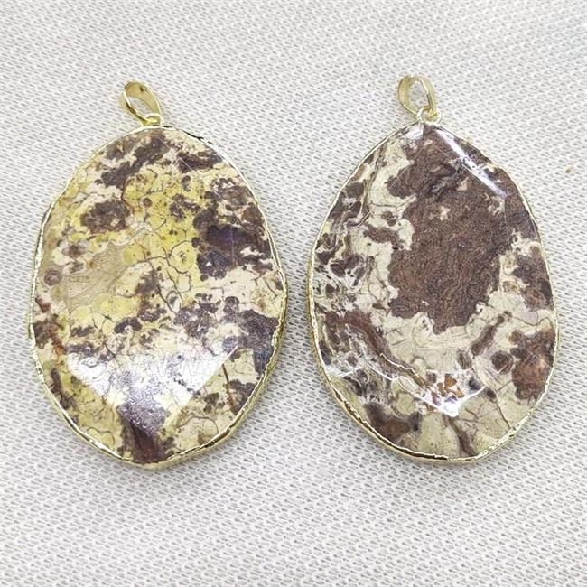 yellow Ocean Jasper oval pendant, faceted, gold plated